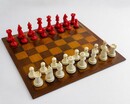 A fine 19th century Staunton chess set, beautifully carved in natural and stained bone. A classic example of the world's most influential chess pattern,