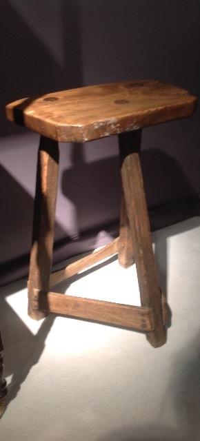 An 19 th Century primitive stool having a very nice patina