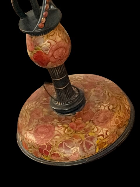 An antique Kashmiri table lamp with a beautifully hand painted base, decorated with colourful floral motifs and fitted with a handmade fabric lampshade.