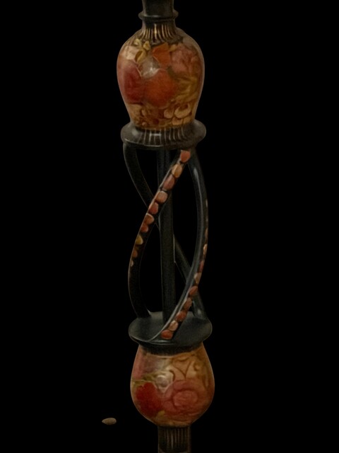 An antique Kashmiri table lamp with a beautifully hand painted base, decorated with colourful floral motifs and fitted with a handmade fabric lampshade.