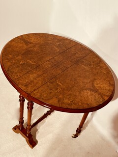 An English 19th Century Burr Walnut Sutherland Table.