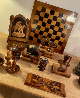 A 19th Century Chess Board. A ' Sorrento Ware ' Reading Stand. An Inkwell in the Form of a Camel and a selection of Treen.