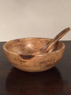 A 19th Century Dug out Birch Bowl, having a very nice patina and a short flat handle with a very nice handmade spoon.