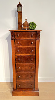 A 19th Century English Burr Walnut Wellington Chest Having Seven Graduated Drawers.