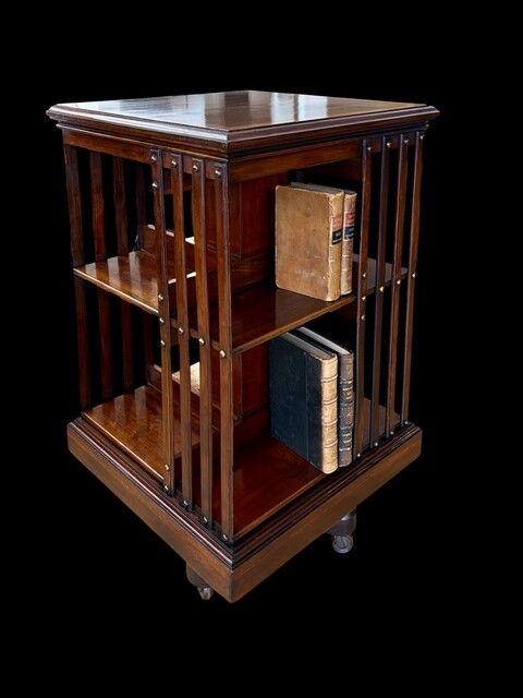 A 19th Century English Mahogany Revolving Bookcase with Satinwood Crossbanded Top