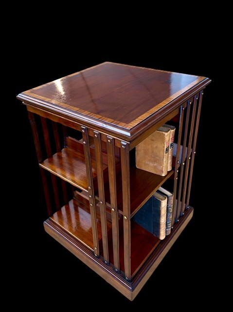 A 19th Century English Mahogany Revolving Bookcase with Satinwood Crossbanded Top