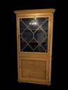 A 19th Century English Pine Corner Cabinet with Astragal Glazed Door.