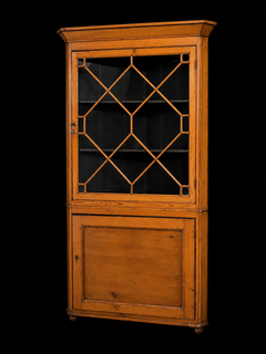 A 19th Century English Pine Corner Cabinet with Astragal Glazed Door.
