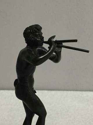 A 19th Century ' Grand Tour ' Bronz of a Faun playing Flutes.