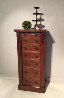 A 19th Century Mahogany Wellington Chest having Seven Graduated Drawers.