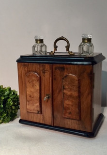 A 19th Century Victorian Burr Walnut inkstand with Stationary Box and two Crital inkwells.   400 €