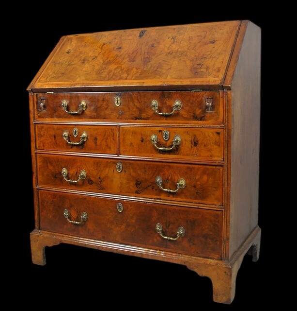 A Beautiful English 18th Century Burr Walnut Bureau having a Stepped Interior and Green Leather.