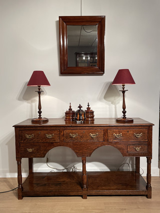 A beautiful English 18th Century Georgian Oak Low Dresser with potboard.