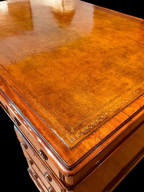 A Beautiful English 19th Century Mahogany Partners Desk having a Stunning Leather.