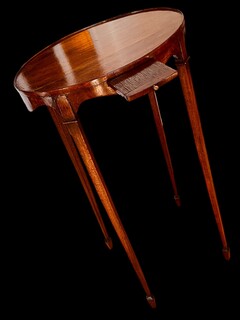 A Beautiful English 19th Century Oval Mahogany Kettle Stand.