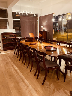 A Beautiful  English Antique Extending Mahogany Pedestal Table. A  Set of Twelve + Two Mahogany Early 19th Century ' Regency' Dining Chairs.