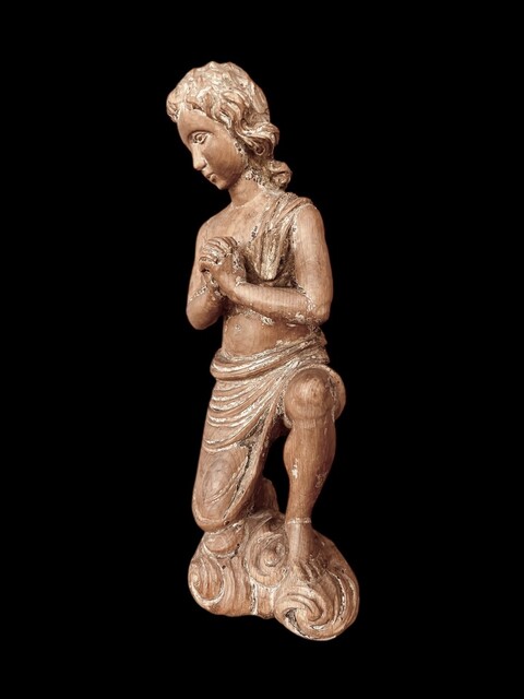 A Carved Wooden Kneeling Angel ( Putto ) . Southern Europe. Circa 18th Century.