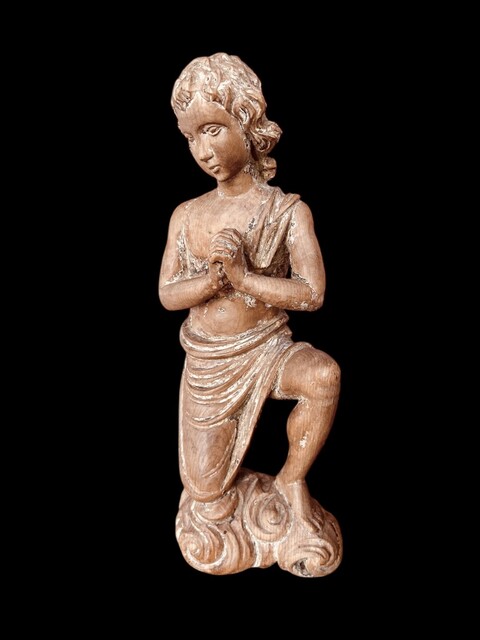 A Carved Wooden Kneeling Angel ( Putto ) . Southern Europe. Circa 18th Century.