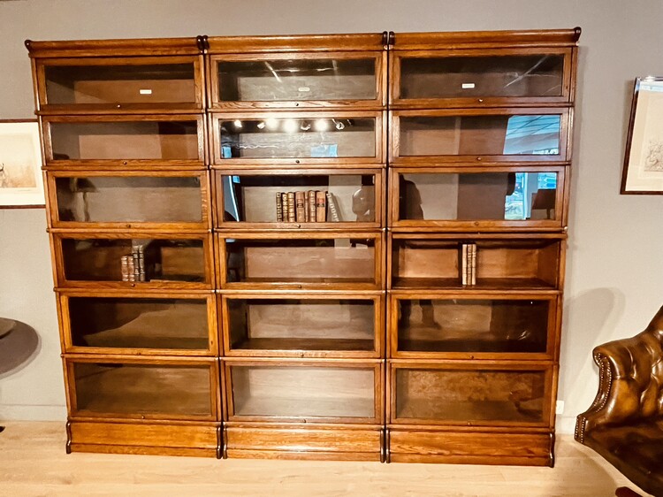 A English Set of three Oak ' Globe Wernicke ' Bookcases. Six Sections high.