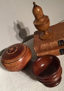 A nice selection of Englsh 19th Century Treen. An Early 19th Century Sycamore Muffineer, A 19th Century Mahogany Pedestal Salt and A 19th Century Tobacco Jar.