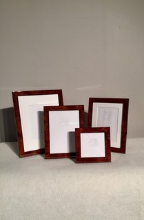 A Set of Contemporary Photo Frames in Burr Walnut.