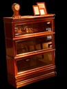A Small English Mahogany Globe Wernicke Bookcase. Three Sections High.