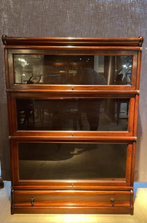 A Small English Mahogany Globe  Wernicke Bookcase. Three Sections high.