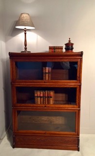 A Small English Oak Globe Wernicke Bookcase.