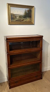 A Small English Oak Globe Wernicke Bookcase. Three Sections high.