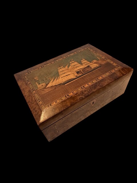 A Victorian English Trinity House Box in burr walnut with maritime marquetry, geometric parquetry borders and a fitted interior, dating from the mid 19th century.