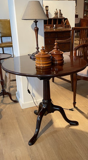 An 18th Century English Tilt-Top Bird Cage Table.