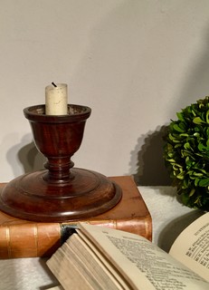 An 18th Century English / Welsh Oak Candle Holder having a deep patina.