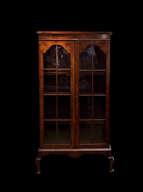 An Antique English Edwardian Burr Walnut Glazed Bookcase