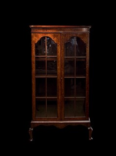 An Antique English Edwardian Burr Walnut Glazed Bookcase