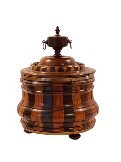 An Early 19th Century Tobacco Jar. Stave construction in Walnut, Ebony and Boxwood. Ca 1800.