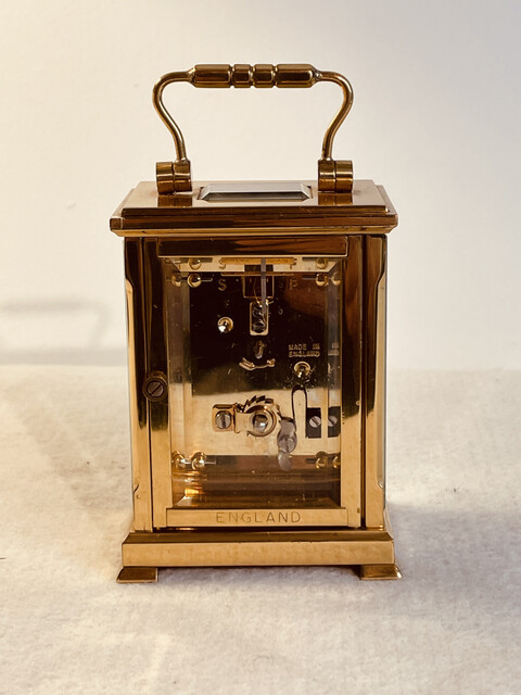 An Early 20th Century Four Glass Brass Carriage Clock with key. Shortland & Bowen