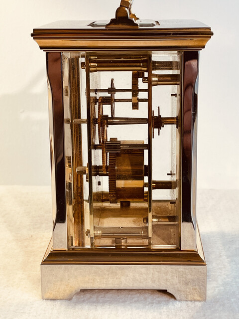 An Early 20th Century Four Glass Brass Carriage Clock with key. Shortland & Bowen