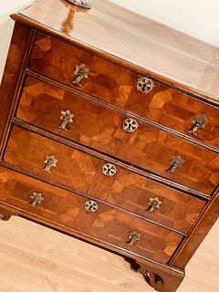 An English 17th Century William and Mary Walnut Chest of Drawers having a beautiful Geometric Marquetry