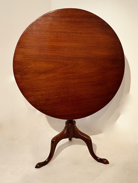 An English 18th Century Georgian Mahogany Tilt Top Table on a Tripod Base.