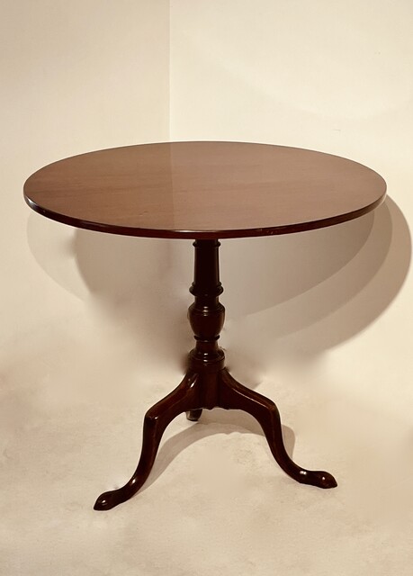 An English 18th Century Georgian Mahogany Tilt Top Table on a Tripod Base.