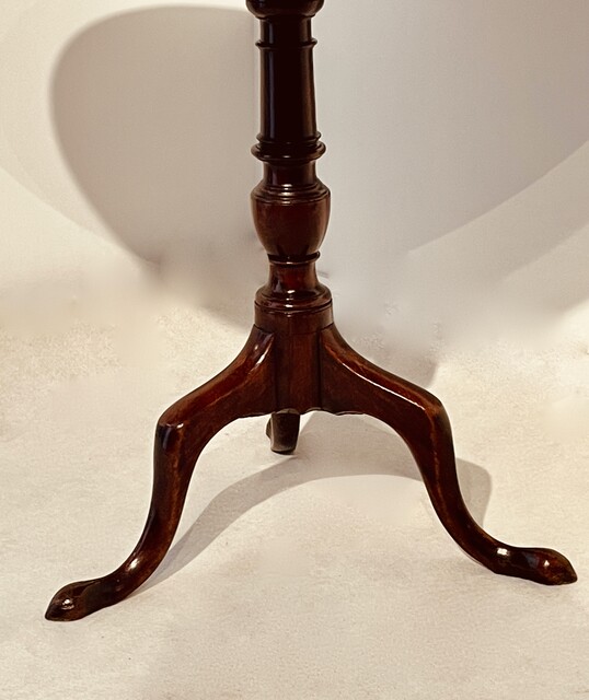 An English 18th Century Georgian Mahogany Tilt Top Table on a Tripod Base.