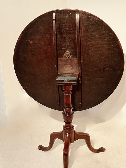 An English 18th Century Georgian Mahogany Tilt Top Table on a Tripod Base.