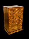 An English 19th Century Burr Walnut Cabinet of Drawers. Signed Heals of London.