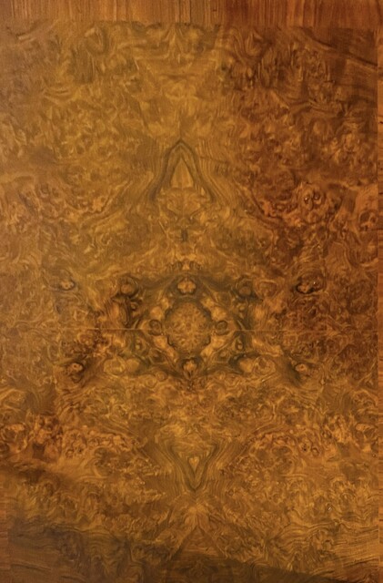 An English 19th Century Burr Walnut Cabinet of Drawers. Signed Heals of London.