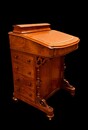 An English 19th Century Burr Walnut Davenport Desk.