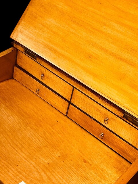 An English 19th Century Burr Walnut Davenport Desk decorated with cross banding throughout and having a satinwood interior.