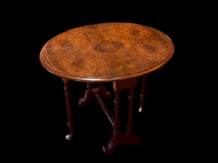 An English 19th Century Burr Walnut Sutherland Table.