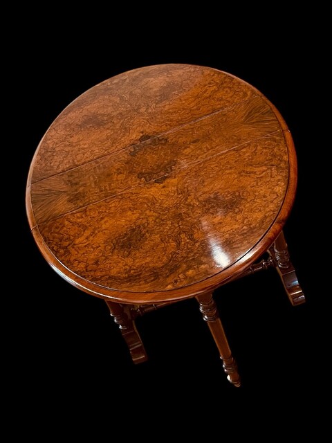 An English 19th Century Burr Walnut Sutherland Table.
