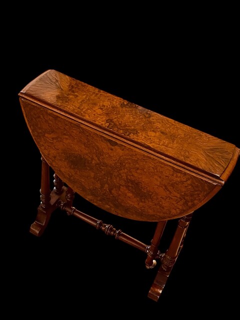 An English 19th Century Burr Walnut Sutherland Table.