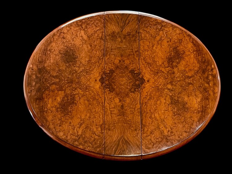 An English 19th Century Burr Walnut Sutherland Table.